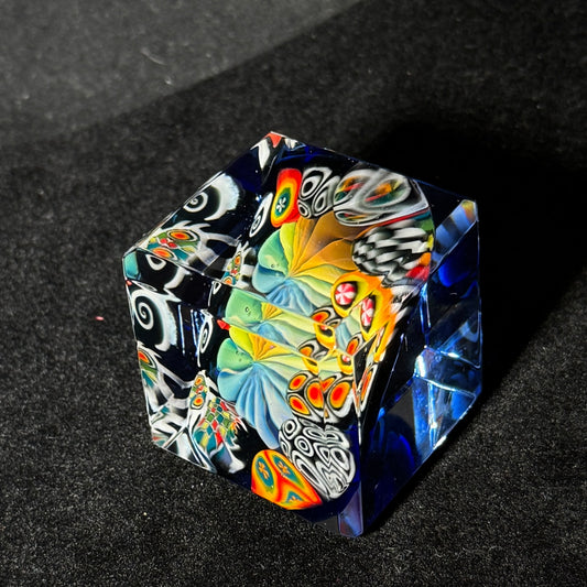 Fume murrini surround hand blown glass cube with cobalt backing