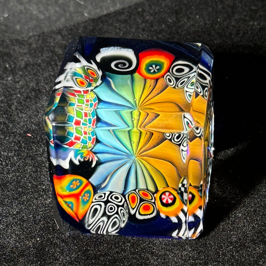 Fume murrini surround hand blown glass cube with cobalt backing