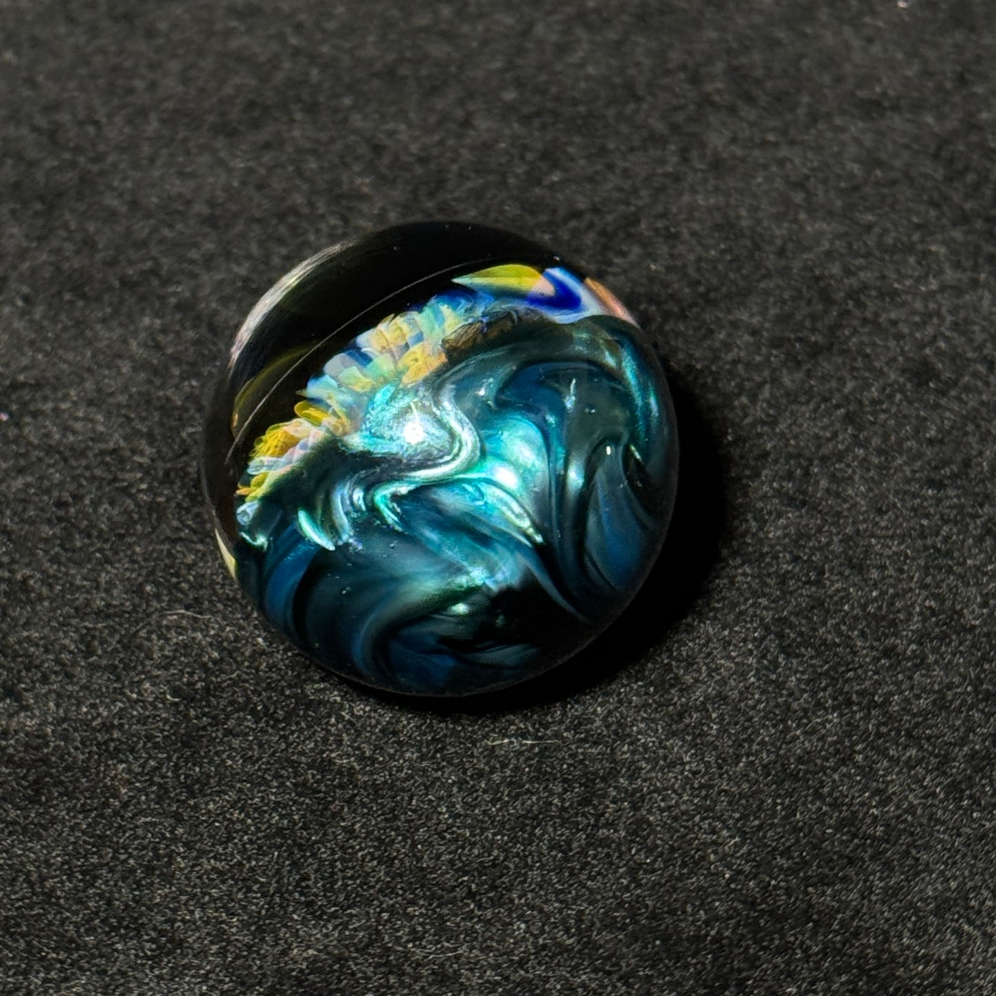 Fumescape implosion blown glass marble with neptunium swirl backing, 36mm