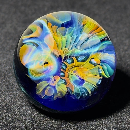 Fumescape implosion blown glass marble with neptunium swirl backing, 36mm