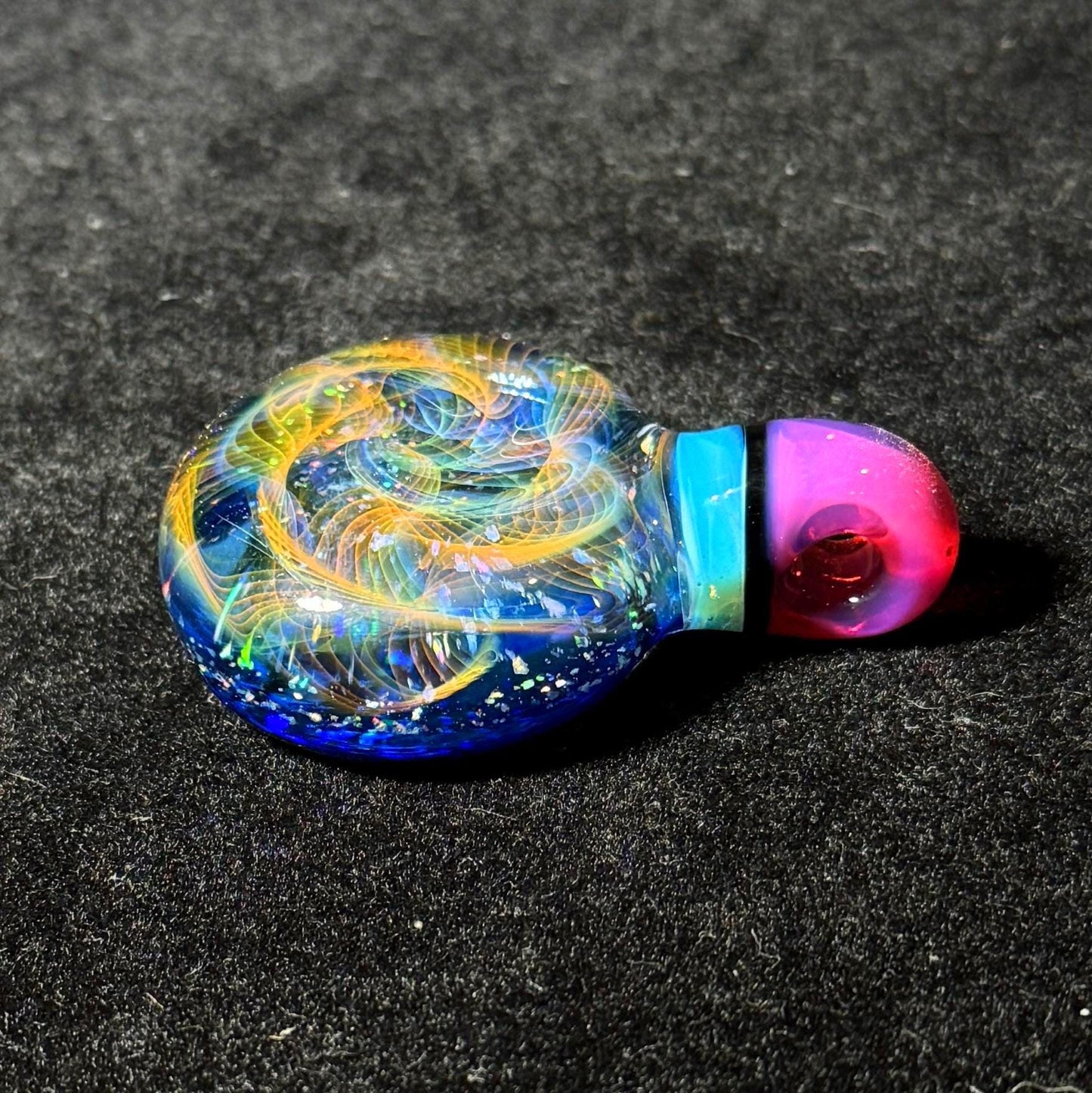 Hand blown glass pendant by Hefe Glass with karmaline pink and meta blue with gold and silver fume and crushed opal