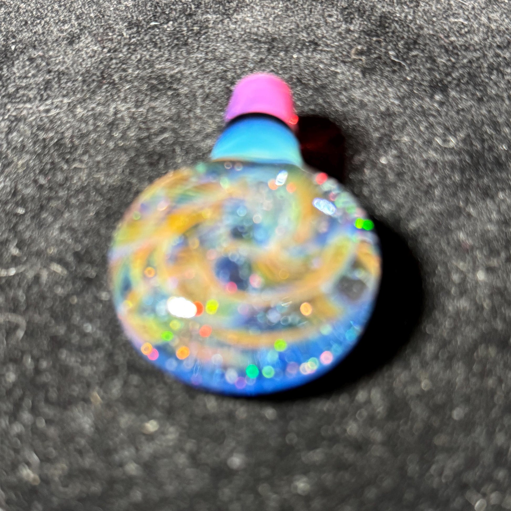 Hand blown glass pendant by Hefe Glass with karmaline pink and meta blue with gold and silver fume and crushed opal