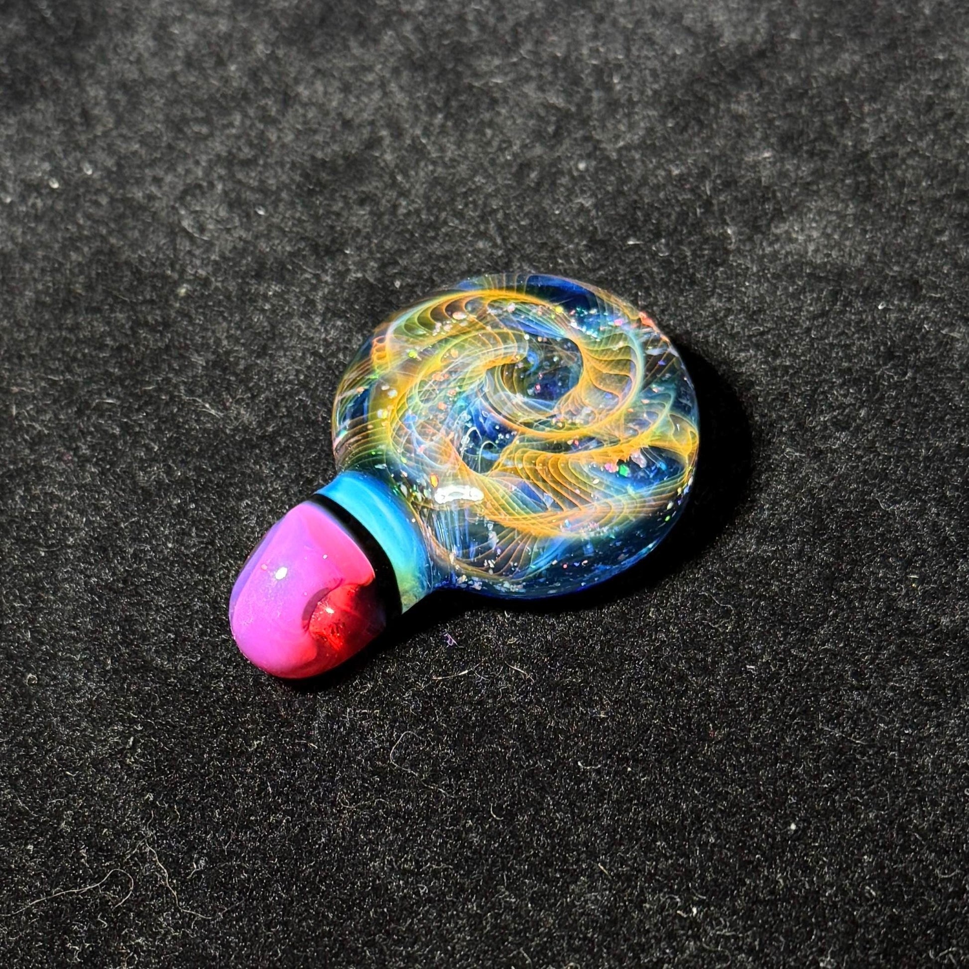 Hand blown glass pendant by Hefe Glass with karmaline pink and meta blue with gold and silver fume and crushed opal