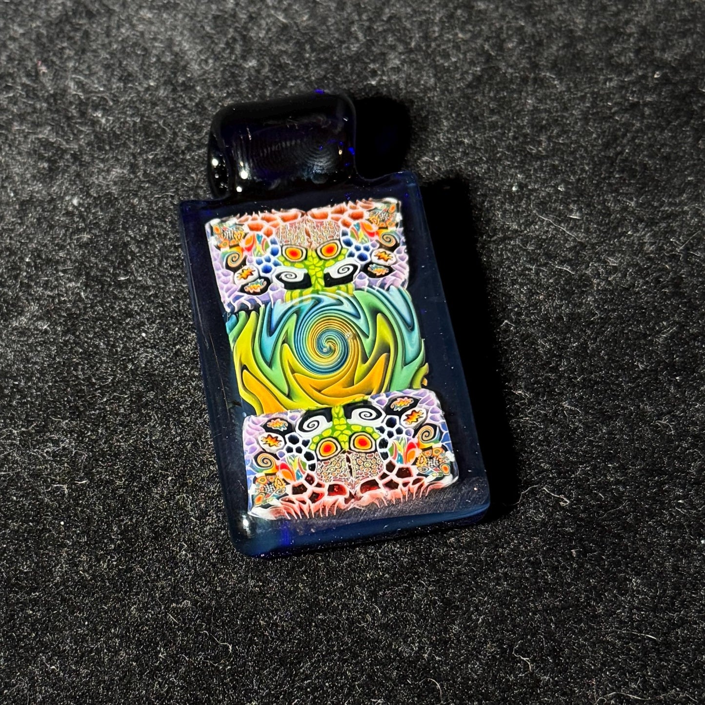 Murrine and rainbow fume fused tablet pendant