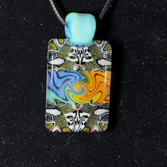 Color changing fume and murrine chip stack blown glass pendant with lucid bail