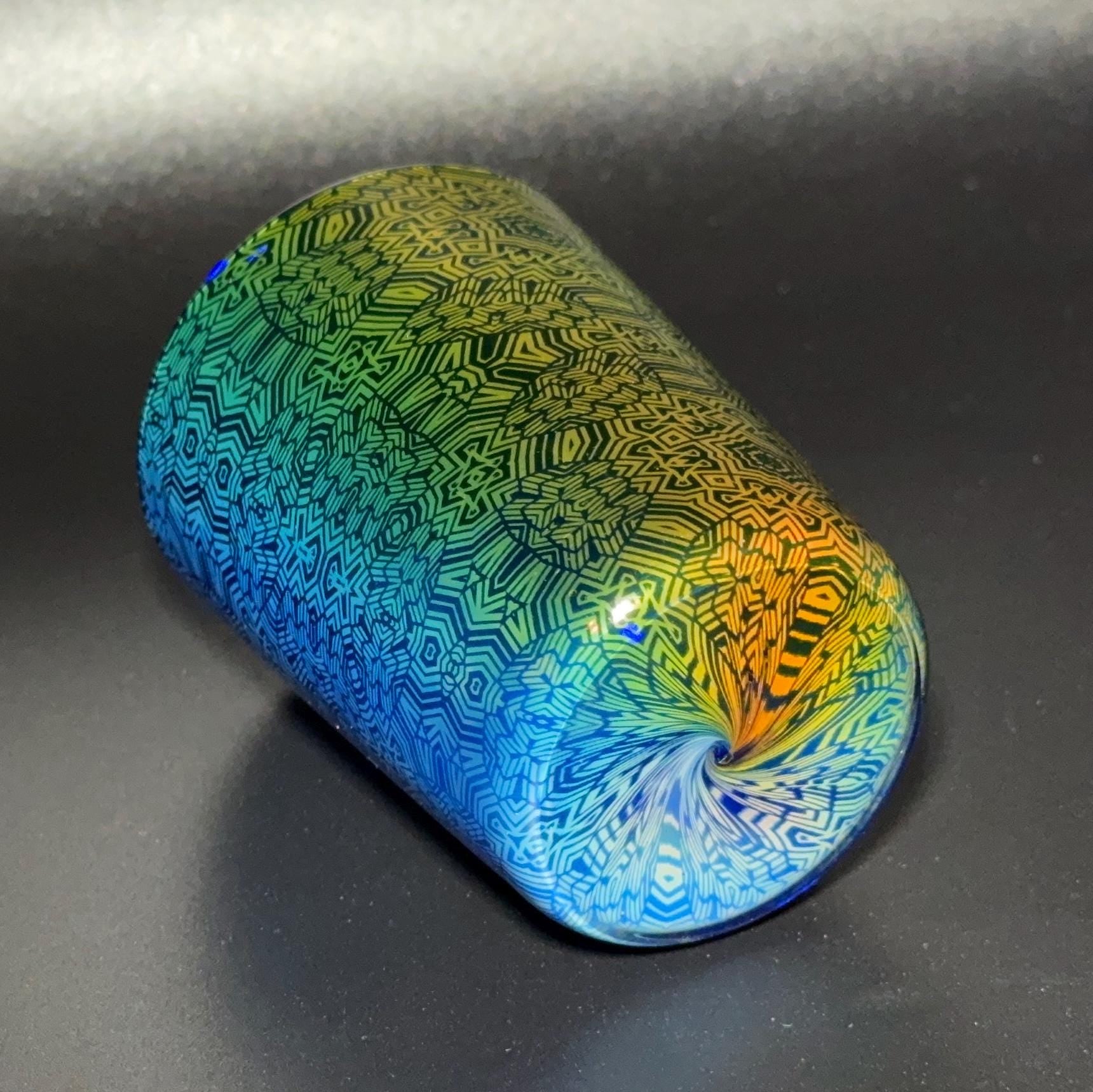 Fume pattern hand blown glass shot cup - vibrant color changing fume gradient over blue