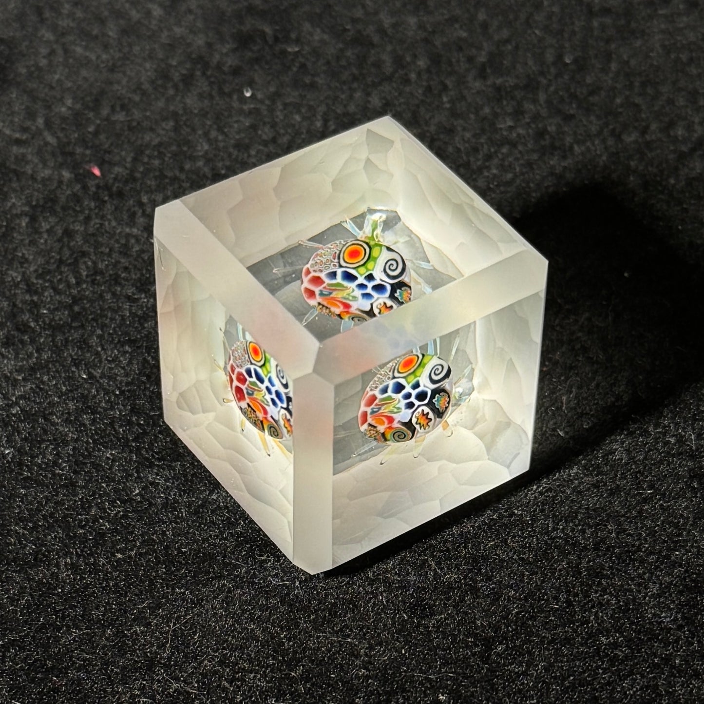 cold worked battuto cut glass cube with murrini implosion by Hefe Glass Remy 