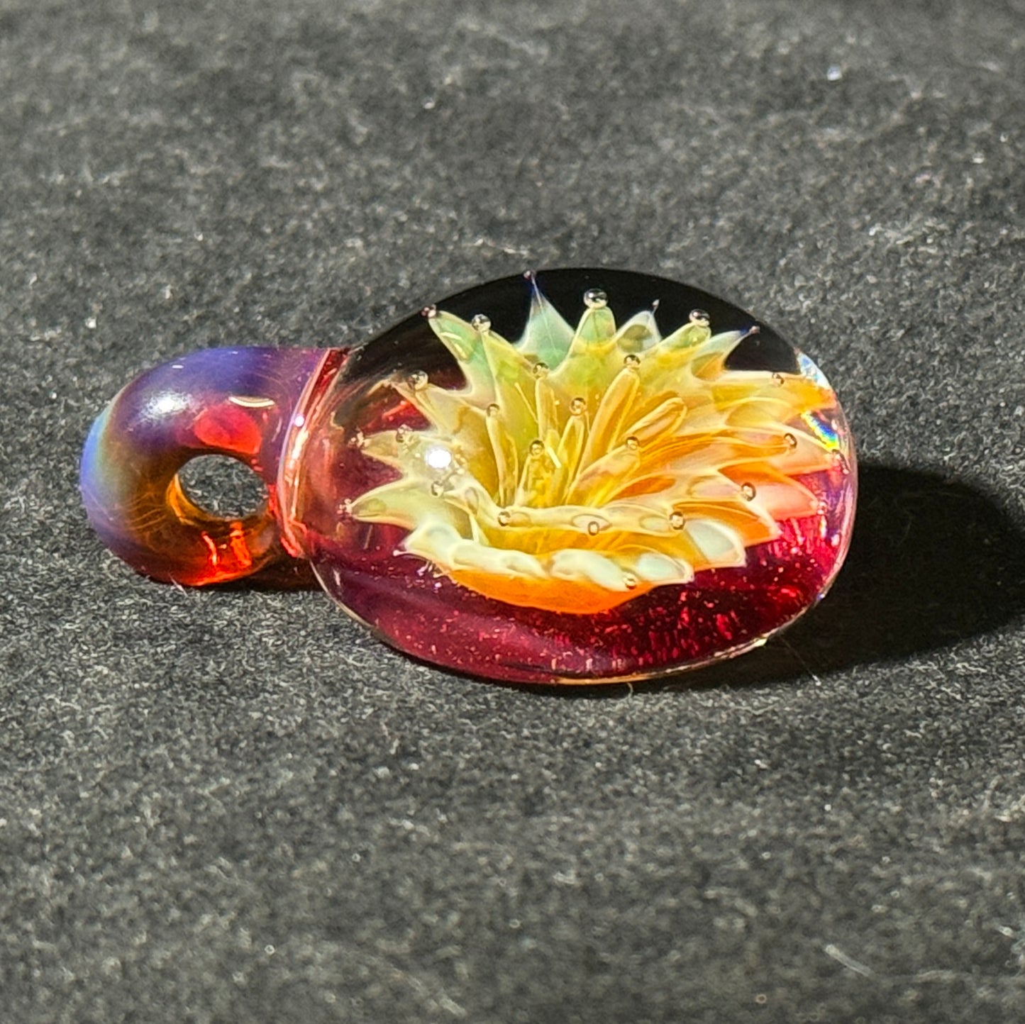 Air trap amberpurple blast implosion pendant, amberpurple bale and phoenix backing