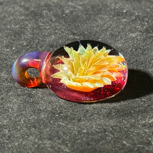 Air trap amberpurple blast implosion pendant, amberpurple bale and phoenix backing