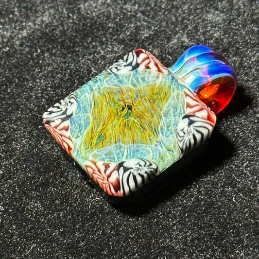 Murrine chip stack hand blown glass pendant with black backing and amber purple bale