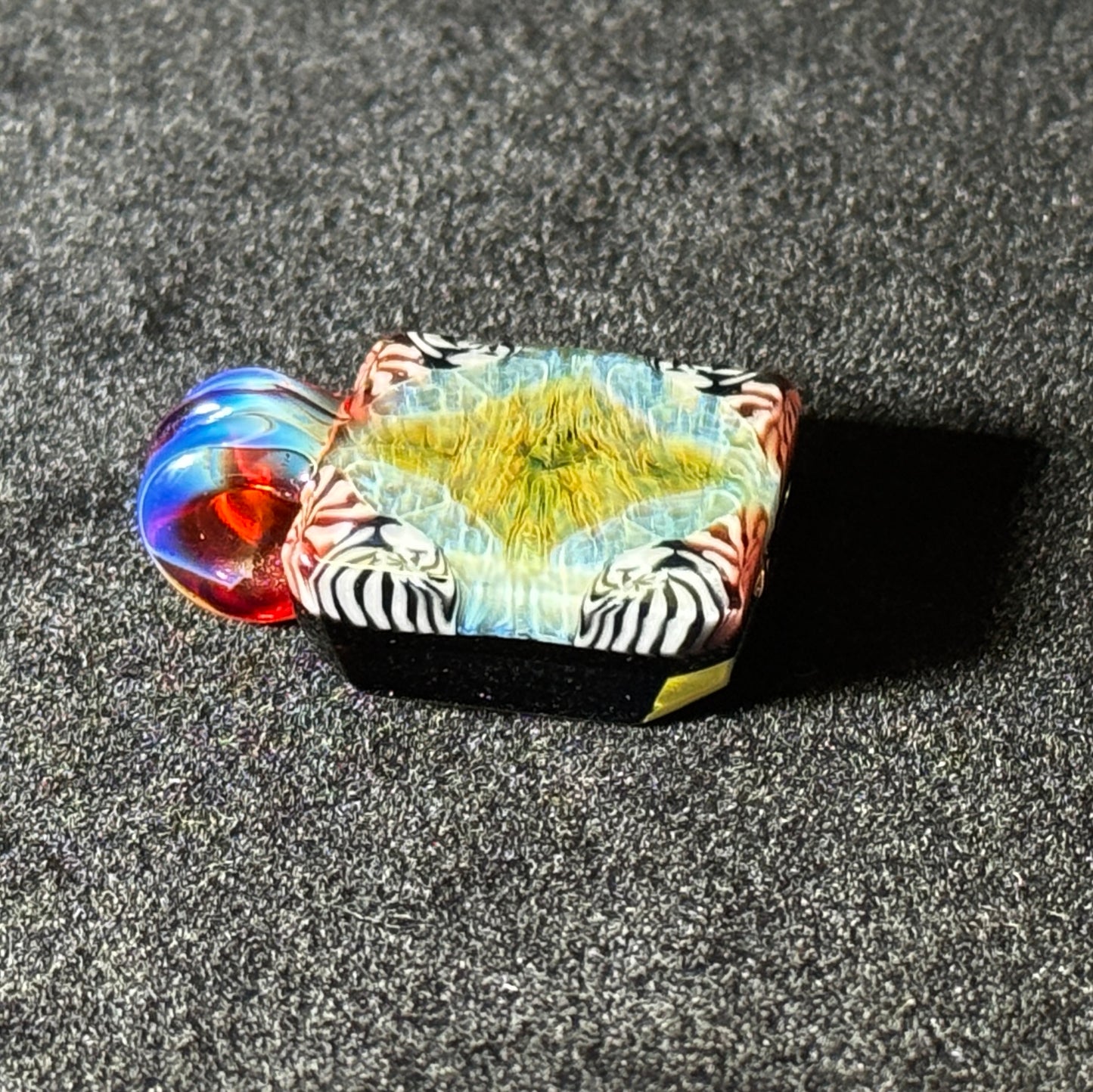 Murrine chip stack hand blown glass pendant with black backing and amber purple bale