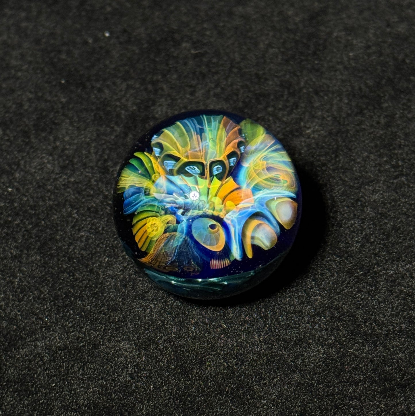 Fumescape implosion blown glass marble with neptunium swirl backing, 36mm