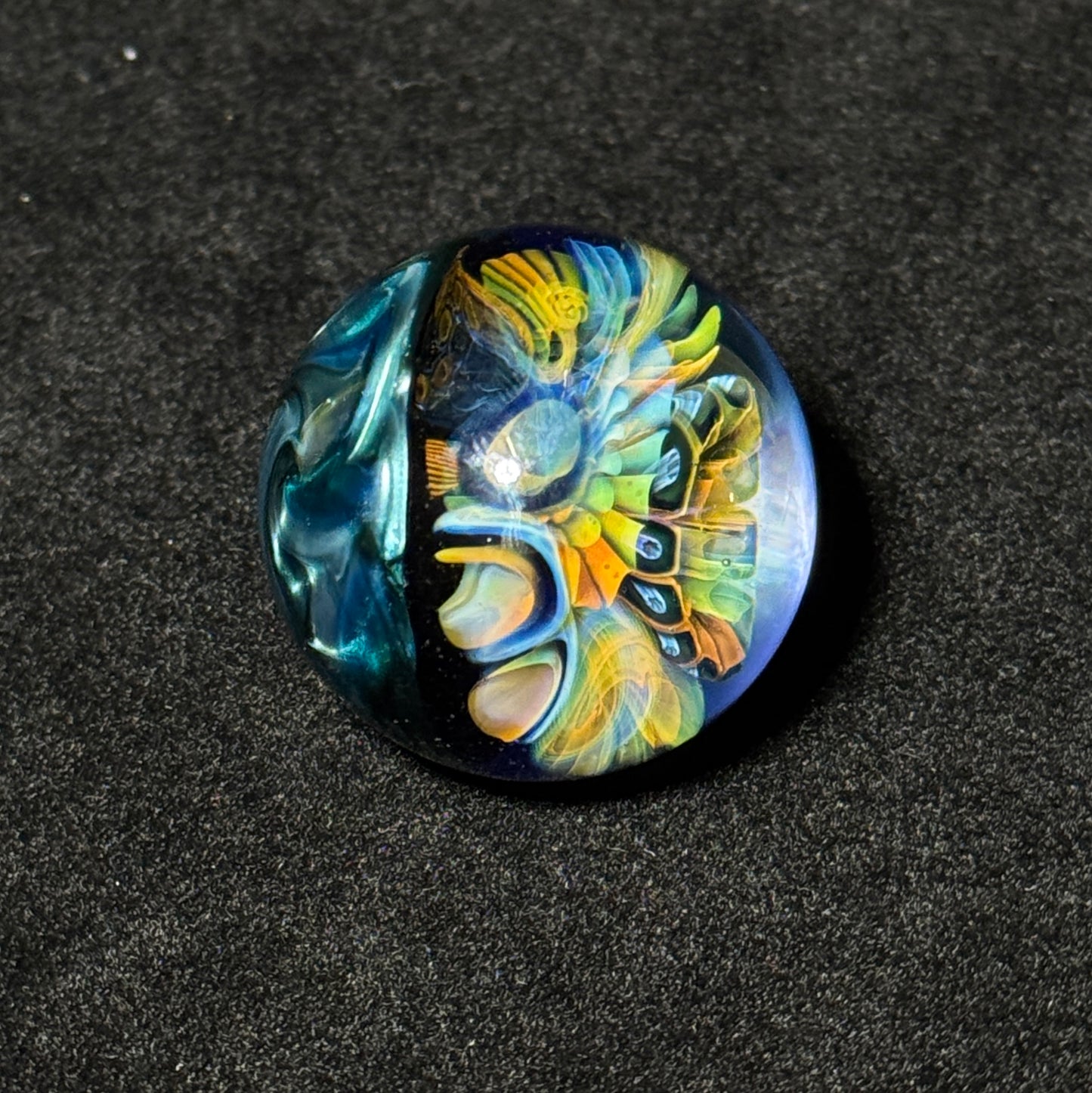 Fumescape implosion blown glass marble with neptunium swirl backing, 36mm
