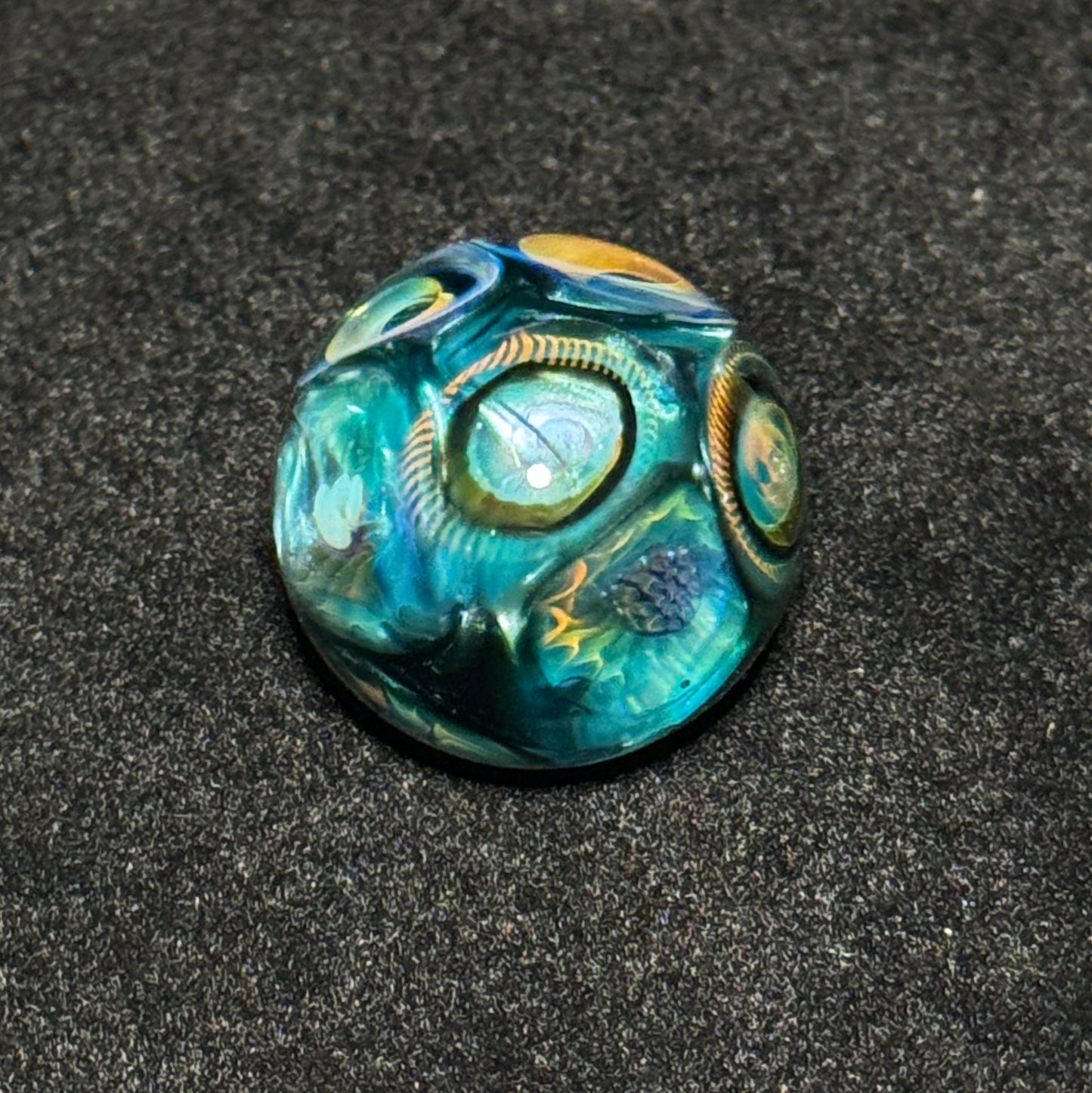 Murrine sleeve over neptunium blown glass marble, 31mm