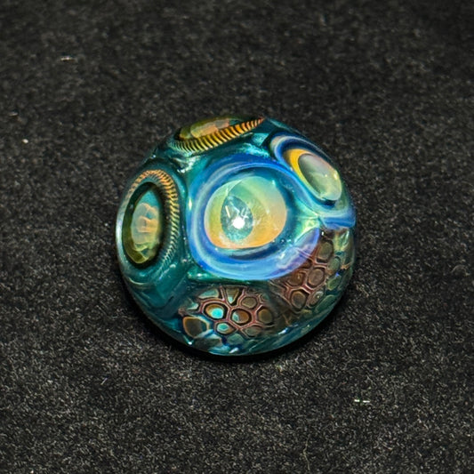 Murrine sleeve over neptunium blown glass marble, 31mm